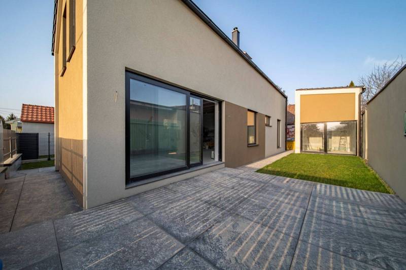 A family house in Poprad with a spacious terrace and glass doors.