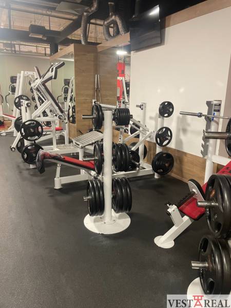 Gym with equipment and facilities in commercial premises.