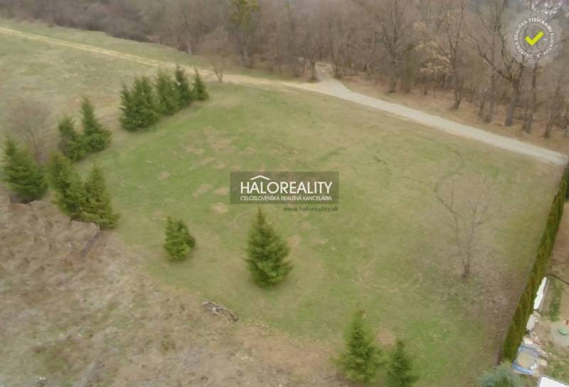 A plot for living in Prešov surrounded by trees and grassy area.