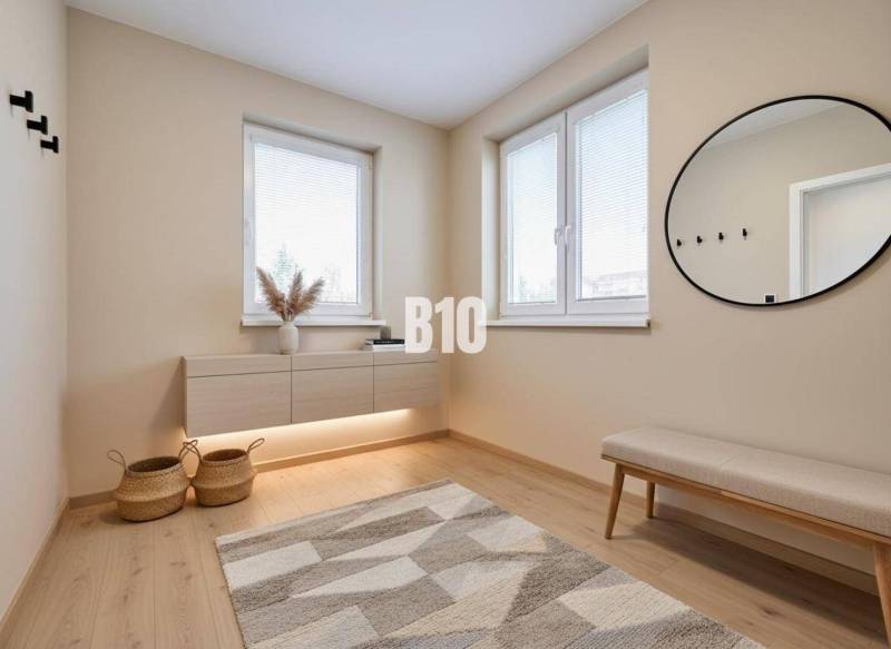 Interior of a family house with a bench, a round mirror, and a floor with a wooden decor.