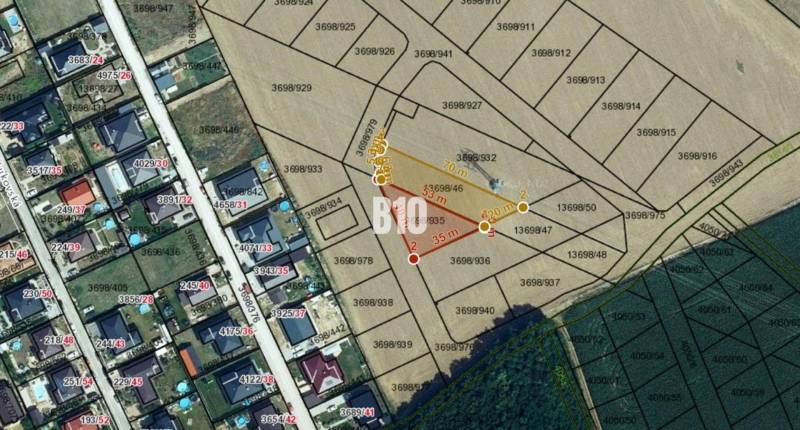 Aerial view of plots and land designated for housing with layout details.