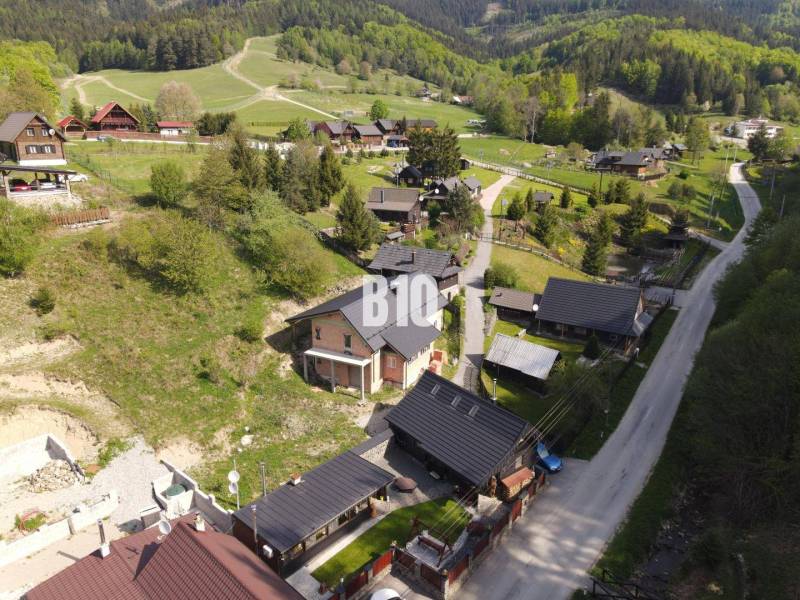 A view of picturesque family houses in the mountainous environment of Horná Mariková.