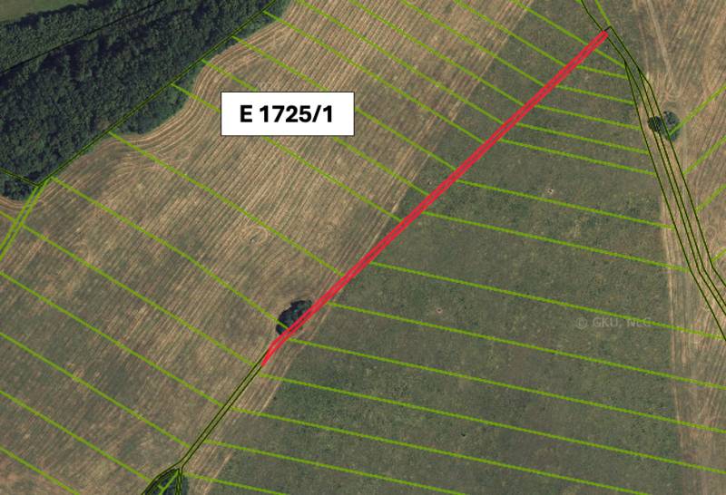 Aerial view of agricultural and forest land in Veľká Čausa with a marked parcel.
