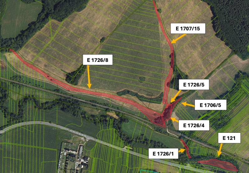 Aerial view of agricultural and forest lands in Veľká Čausa with marked parcels.