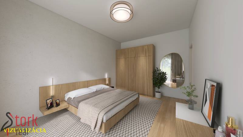 A bedroom in a family house with a double bed, a wardrobe, and a wooden decor floor.