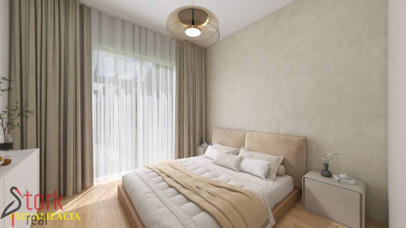 A bright bedroom with a large window, beige curtains, and a wooden decor floor.