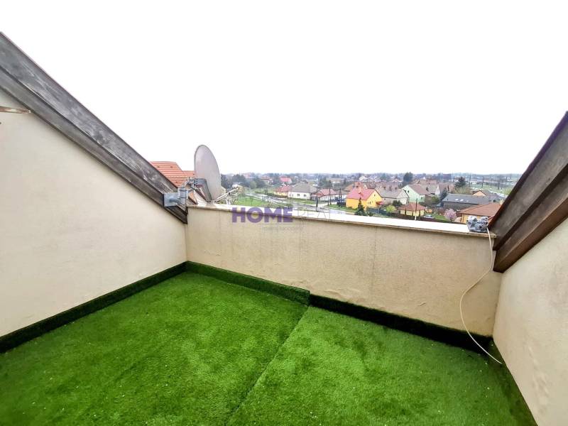 Rajka offers a view of the surrounding neighborhood from the terrace on Bem apo utca street.