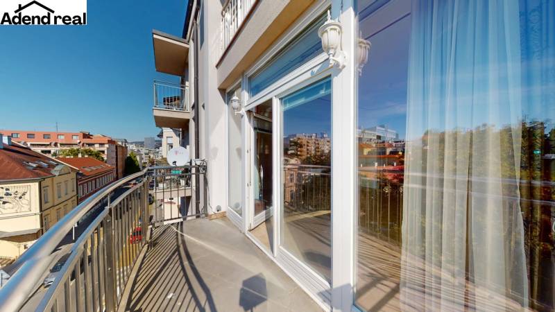 A balcony on an apartment building on Lazaretská Street in Bratislava, with a view of the surroundings.