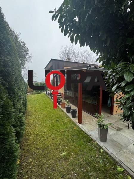 In Nové Zámky, there is a cottage with a landscaped garden and a terrace.