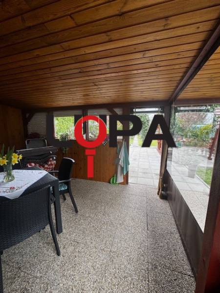 A cottage in Nové Zámky with a bright terrace and pleasant seating.