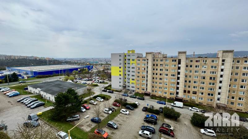 A view of the housing estate, parking lot, and buildings on Sofijska Street, Košice - Ťahanovce Housing Estate.