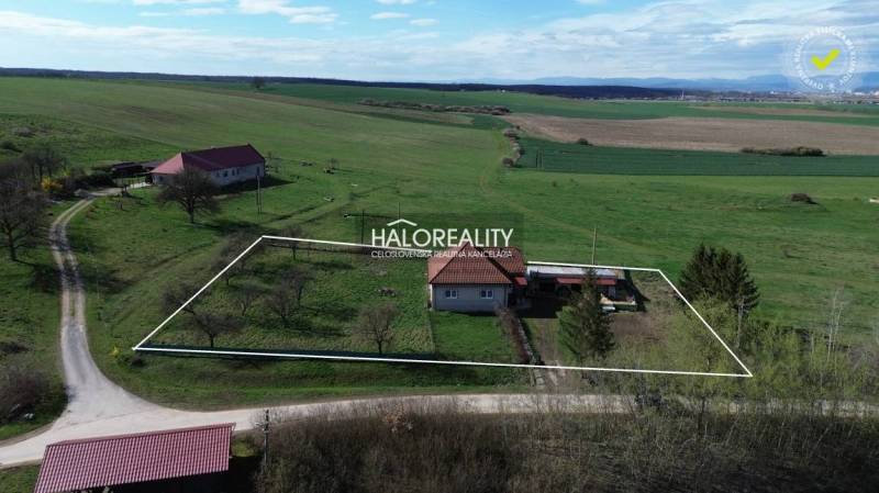 A family house in Rimavské Janovce with a large plot of land and in a peaceful rural setting.