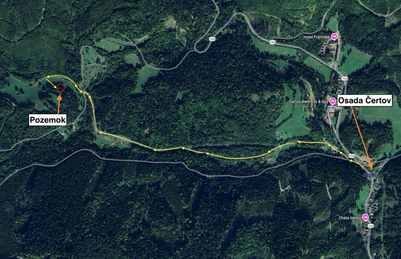 Aerial view of agricultural and forest land in Lazy pod Makytou, showing the road to the plot.