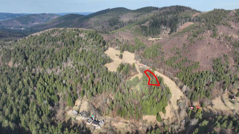 Aerial view of agricultural and forest land in Lazy pod Makytou with marked area.