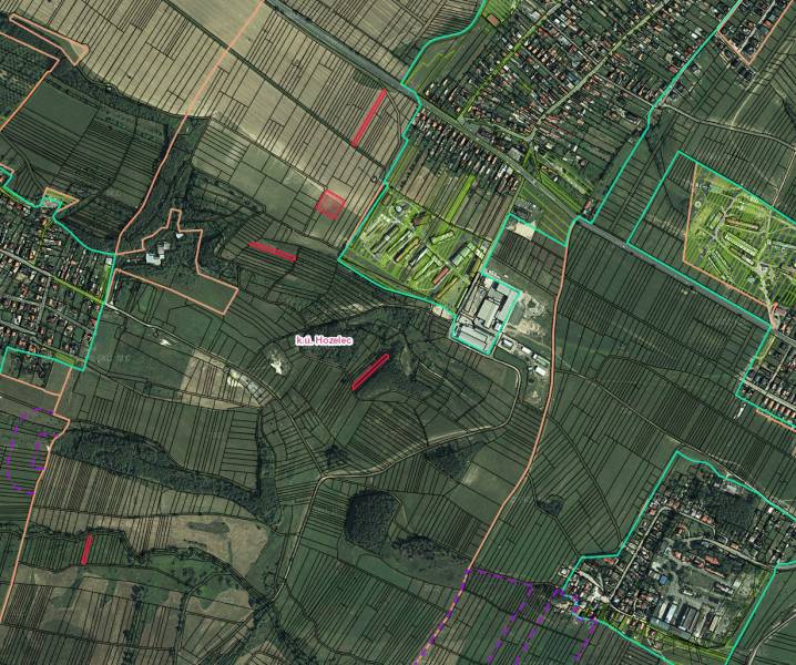 Aerial view of agricultural and forest lands around the village of Hozelec.