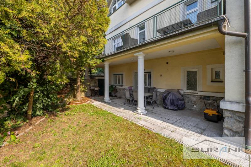 Garden with seating at a 4-room apartment on Krčméryho Street, Bratislava - Staré Mesto.