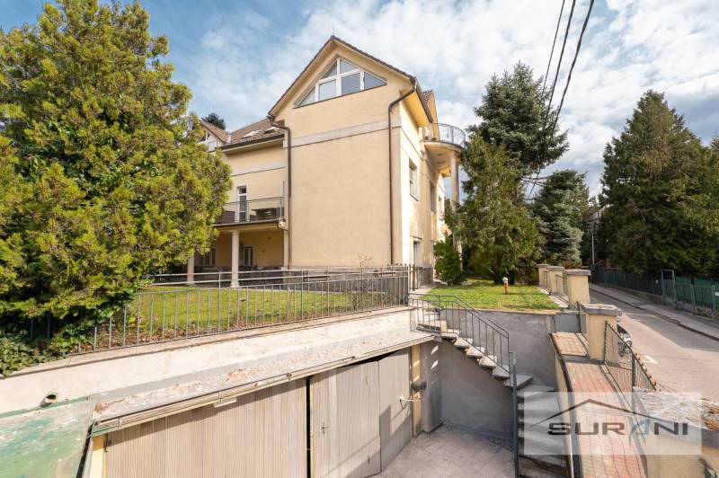 Yellow house with a garden and garage on Krčméryho Street in Bratislava - Old Town.