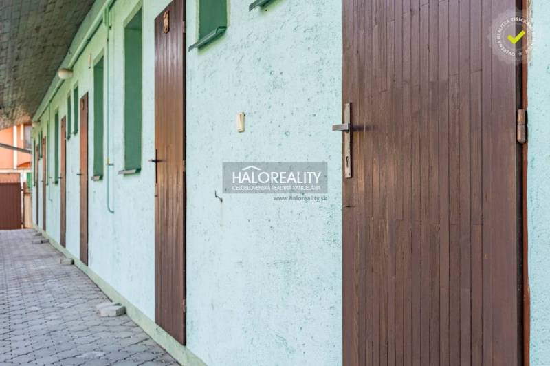 A corridor with doors next to each other in accommodation in Veľký Meder, hotels and guesthouses.
