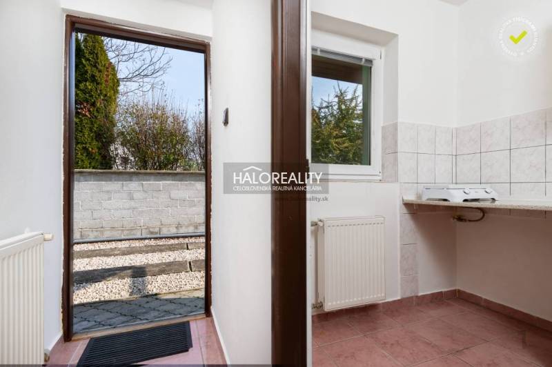 Interior with tiles and a view of the terrace in hotels and guesthouses.