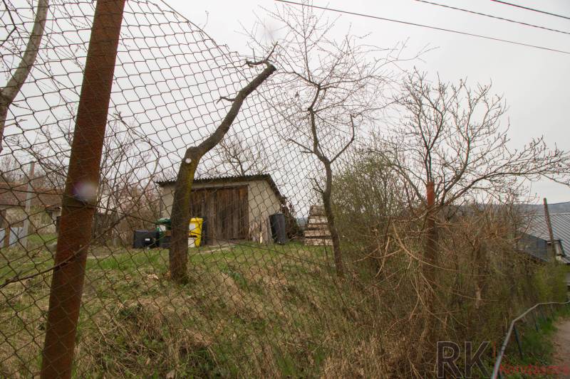 Plots, trees, and shelter in Kostoľany nad Hornádom, surroundings of a family house.
