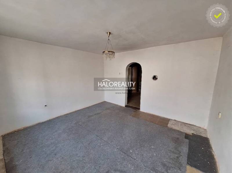 Interior of a room with white walls, carpet, and chandelier, Property - housing.
