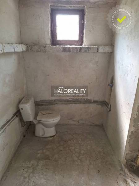 Toilet in a rustic space, Land - living.