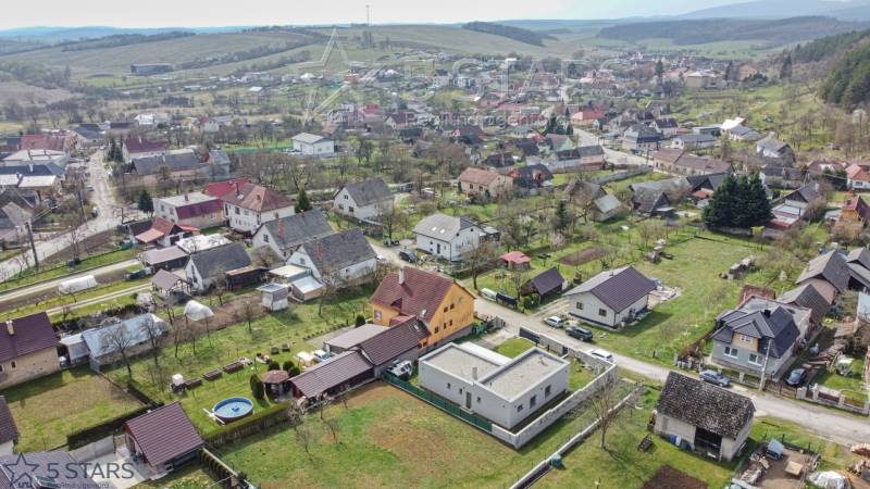 Aerial view of family houses in the village of Neporadza on Bošianska Street.
