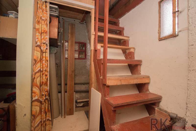 Wooden stairs leading to the upper floor, interior of the Recreational Grounds.