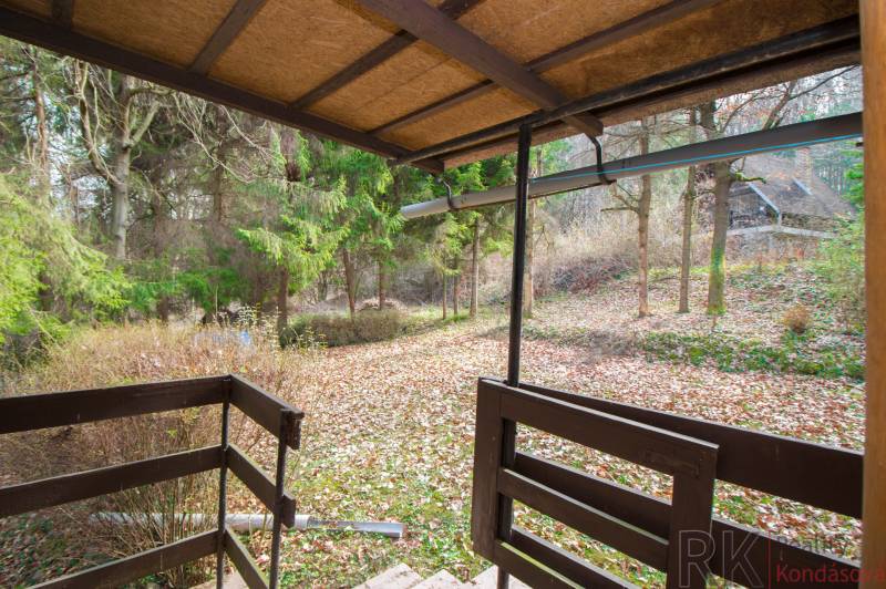 View from the terrace at the Recreational Grounds in Holčíkovce with autumn leaves and trees.