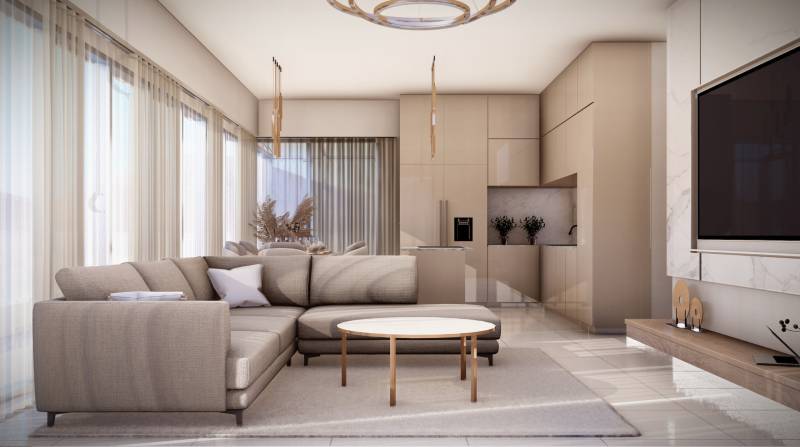 Living room with a sofa, table, and kitchenette in a 4-room apartment.