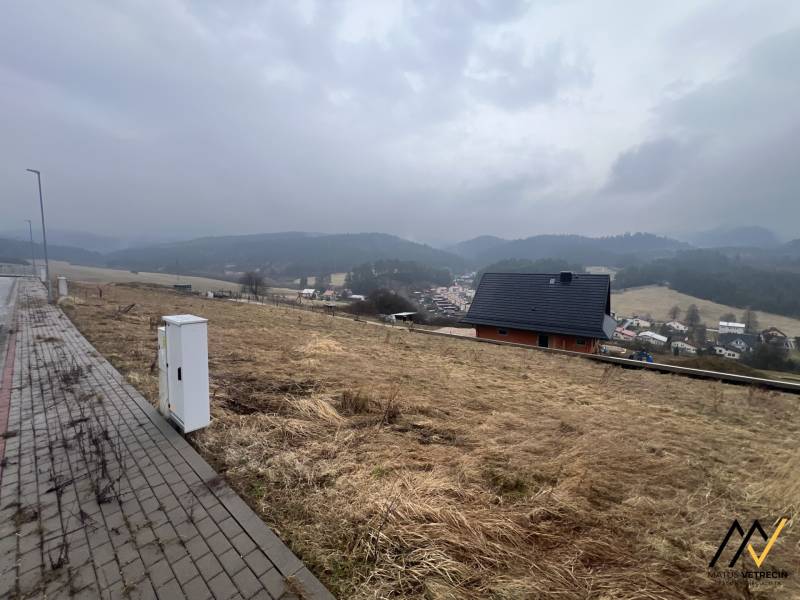 Plots - housing in Stará Ľubovňa with a view of the hills and rooftops.