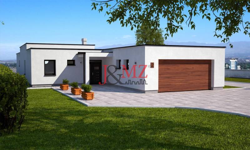 A family house in Dolná Seč with a white facade, a large terrace, and a green lawn.
