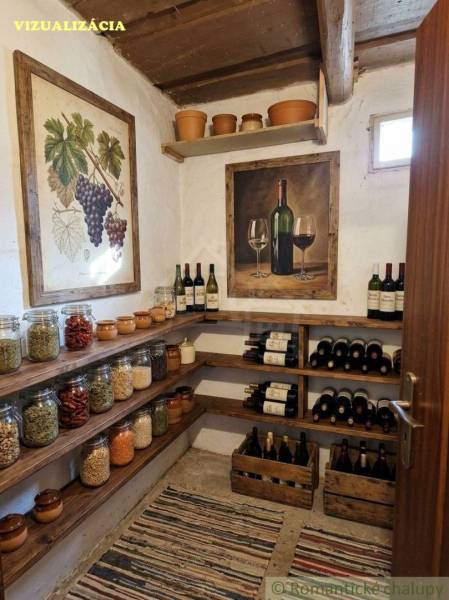 A pantry in a family house with wine shelves and food jars.