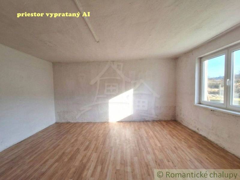A room with a wooden decor floor in a family house.