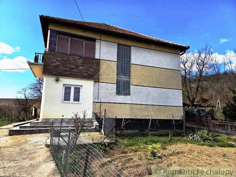 A family house in Kiarov with a balcony and a garden on a visible plot.
