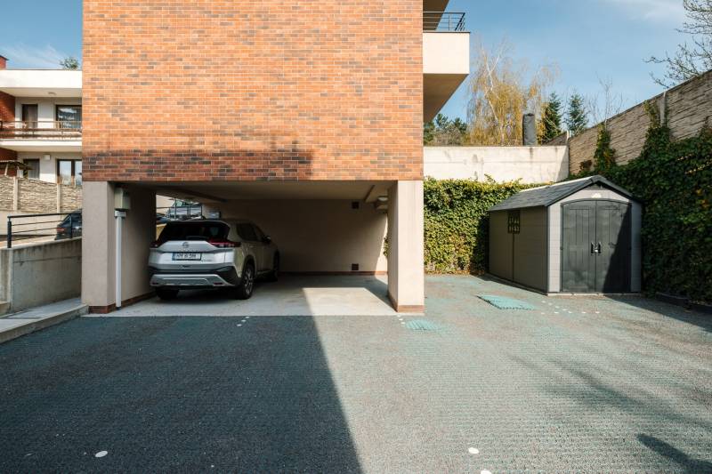 Hidden parking area with driveway and shelter on Cesta na Klanec Street, Bratislava-Lamač.
