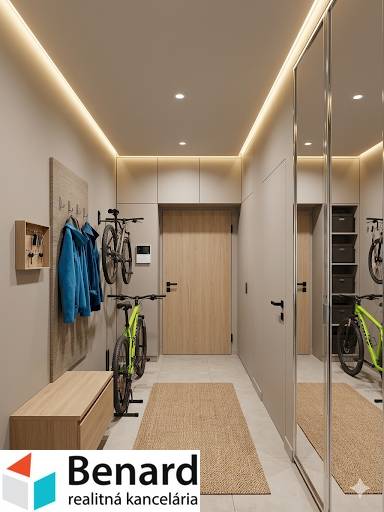 Interior of a 3-room apartment with a wooden decor floor and a mirrored wardrobe.