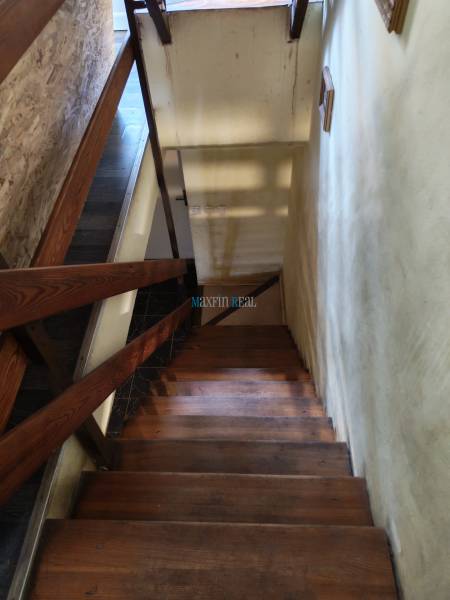 A staircase with a wooden decor in a family house.
