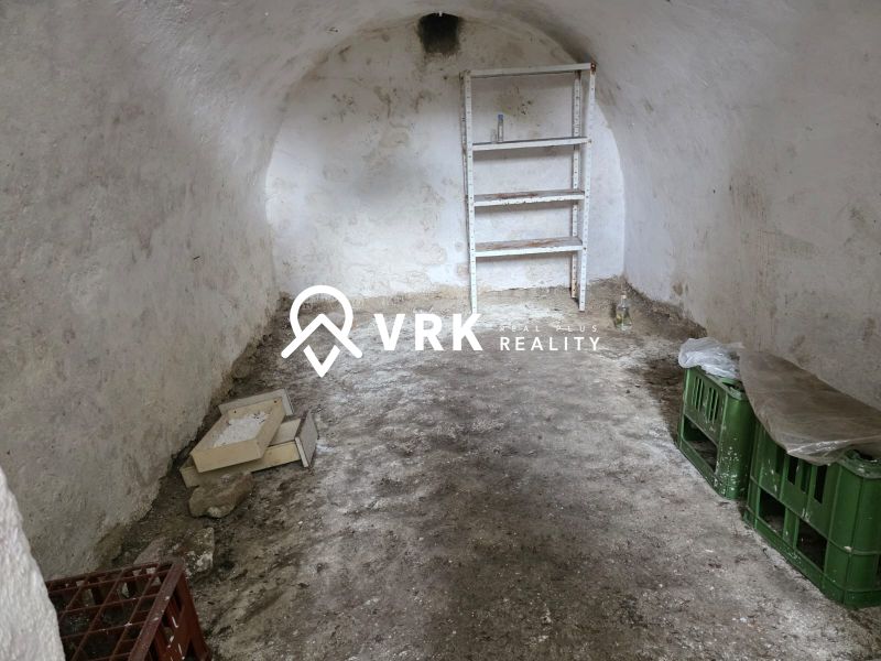 Stone cellar with a shelf, box, and crates, Land - living.