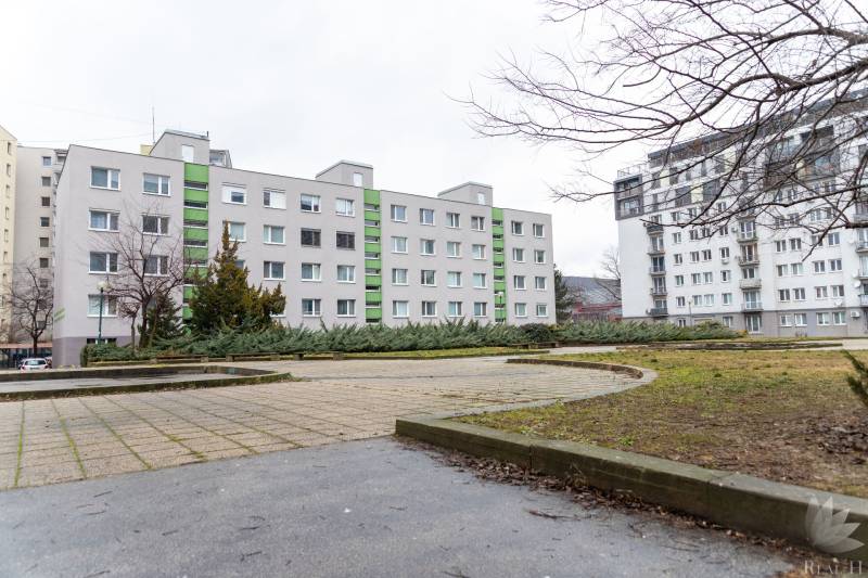 Apartment building on Ondavská Street, Bratislava - Nivy, near a landscaped park.