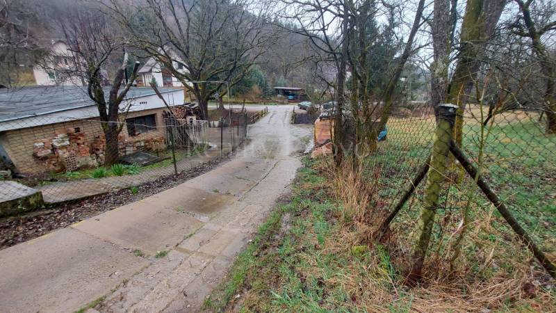 Country houses and roads surrounded by nature on recreational plots near Púchov.