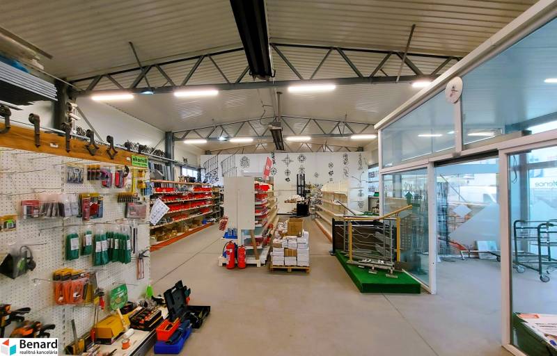 Retail spaces containing shelves with goods, racks, and stands with corporate advertisements.