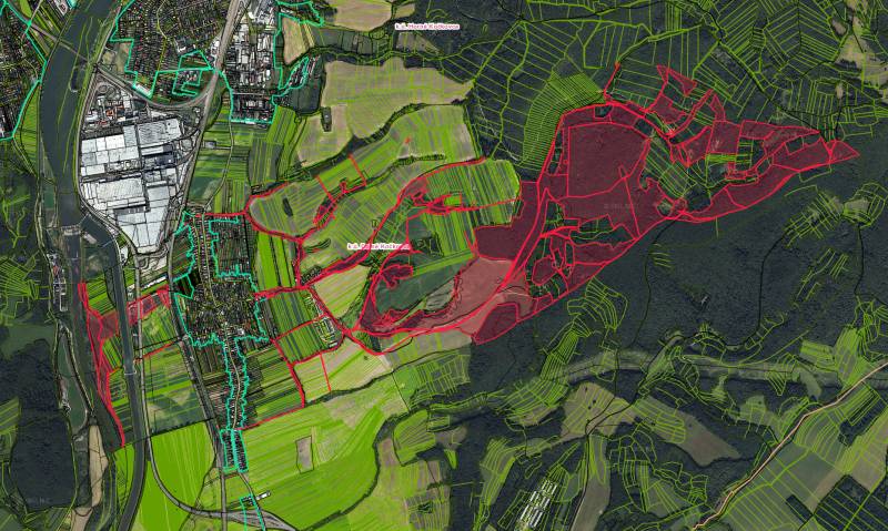 Cadastral map of agricultural and forest land in Dolné Kočkovce with highlighted boundaries.