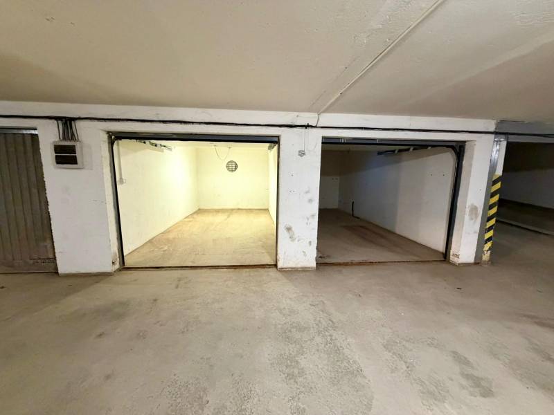 Garages with white walls and concrete floor, Dunajská Streda, Nová Ves.