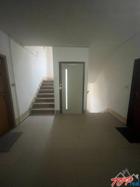 Staircase and entrance door in the building on Postupimska Street, Košice - Dargovských Hrdinov district.