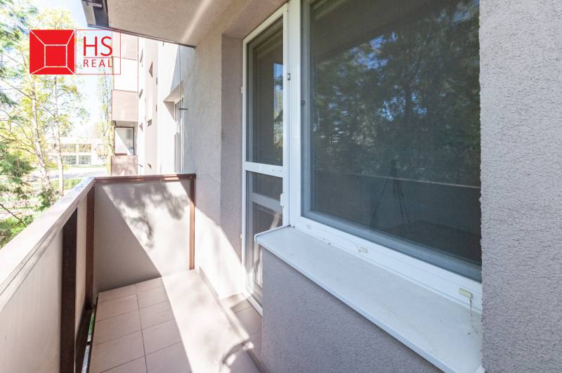 A balcony in a 3-room apartment with a view of greenery in Nové Zámky, Nábrežná Street.