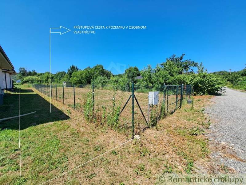 A plot of land for residential use in Hosťová with a private access road.