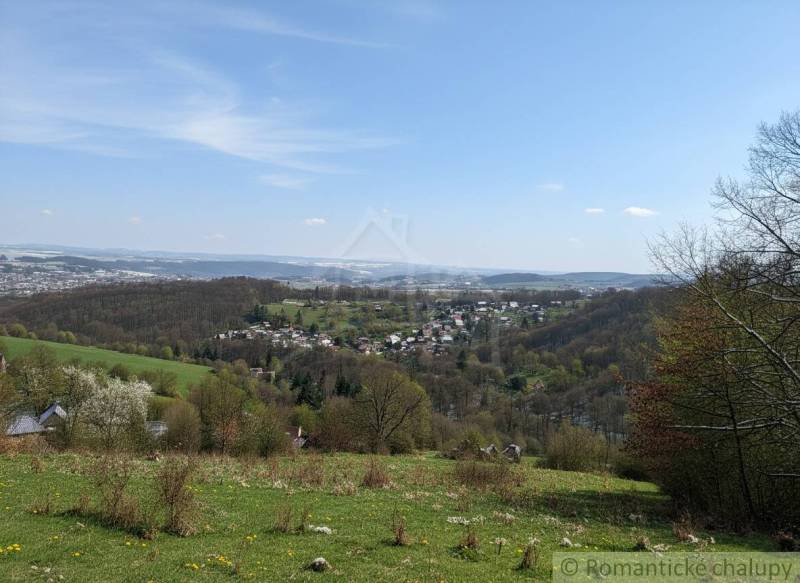 Landscape with a view of the village and surrounding nature in Krupina for residential land.