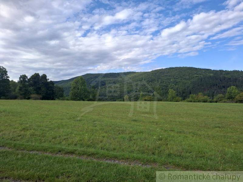 The greenery and hills in the Horný Tisovník area offer opportunities for residential plots.