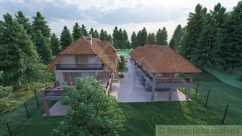 A family house in Šiatorská Bukovinka surrounded by trees with a wooden terrace and garden seating.